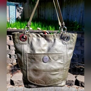 Coach Alex OP Art patent leather shoulder bag with front pocket